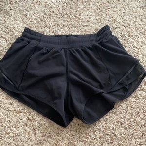 Hotty Hot Low-Rise shorts. Black- size 4